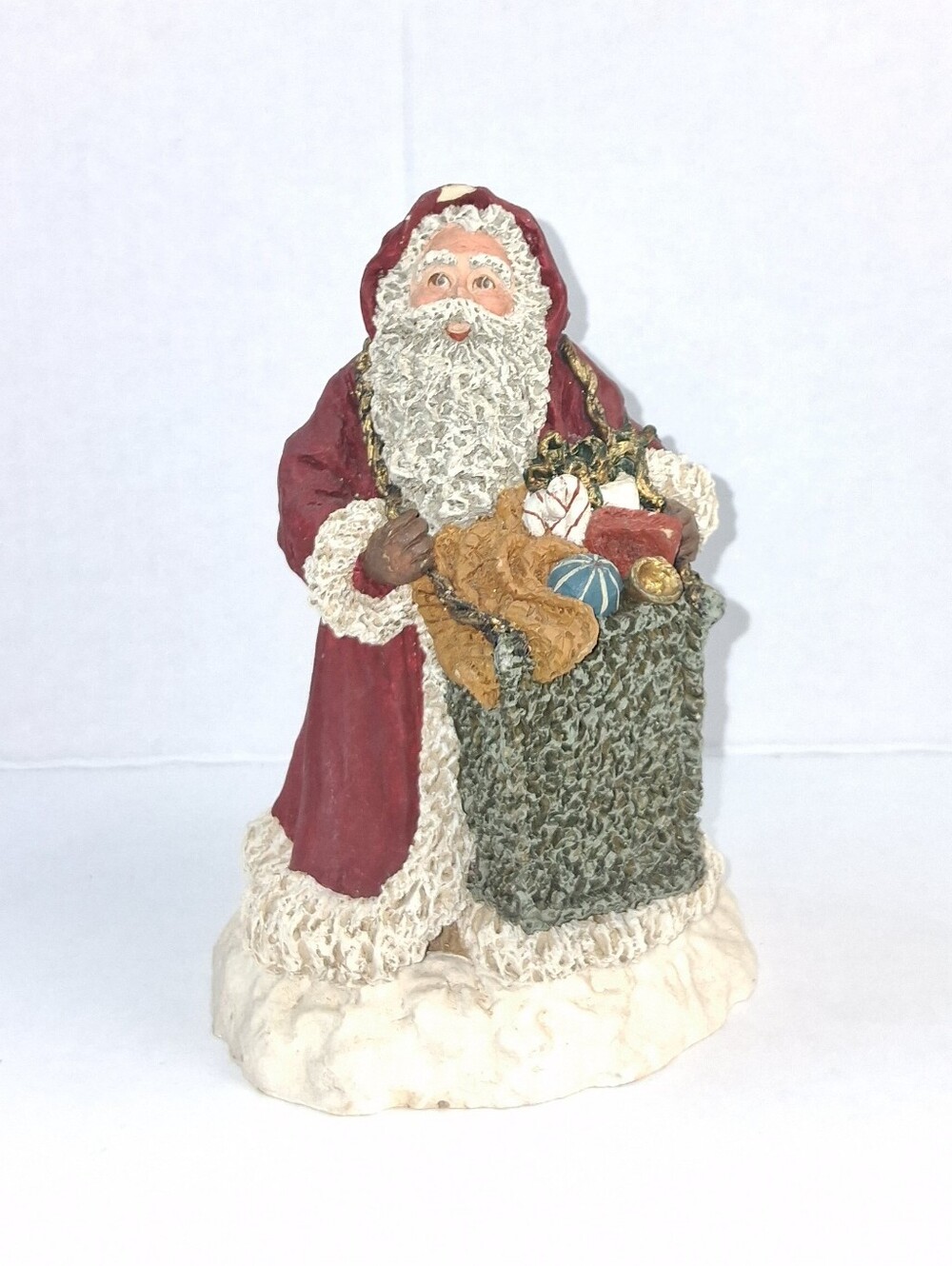 June McKenna 1989 Sanra Claus w/ Green Toy Sack Figurine. Signed 1808/7500